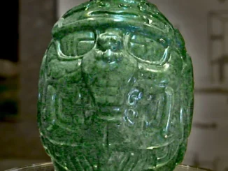 Jade Head of Belize representing the Maya sun god Kinich Ahau, carved from green jadeite