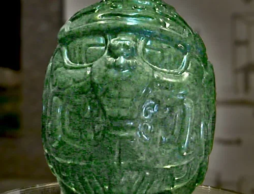 Jade Head of Belize representing the Maya sun god Kinich Ahau, carved from green jadeite